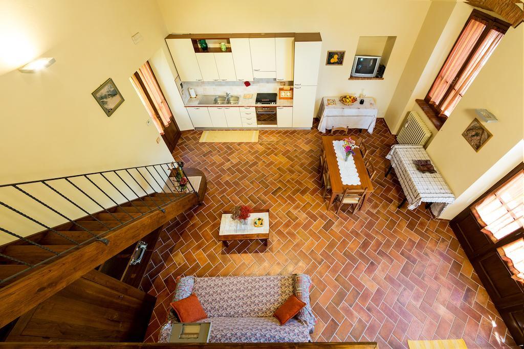 Casale Vacanze Il Granaio Кортона Номер фото